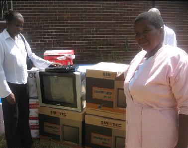Staff at Thorngrove infectious diseases hospital inspect the consignment sent by ZimHealth to the hospital